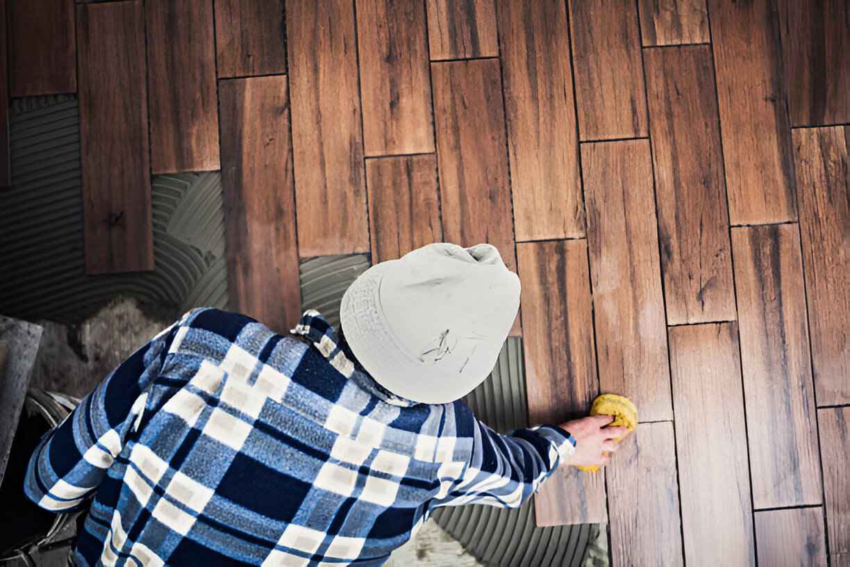 contractor installing floor